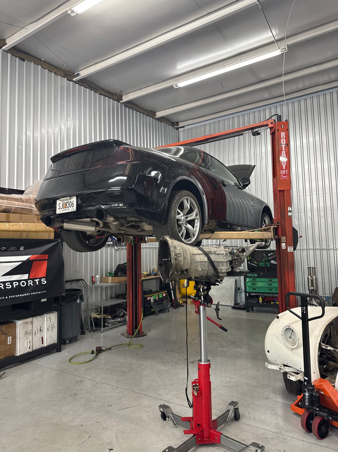 Infiniti G37 during transmission service in the workshop