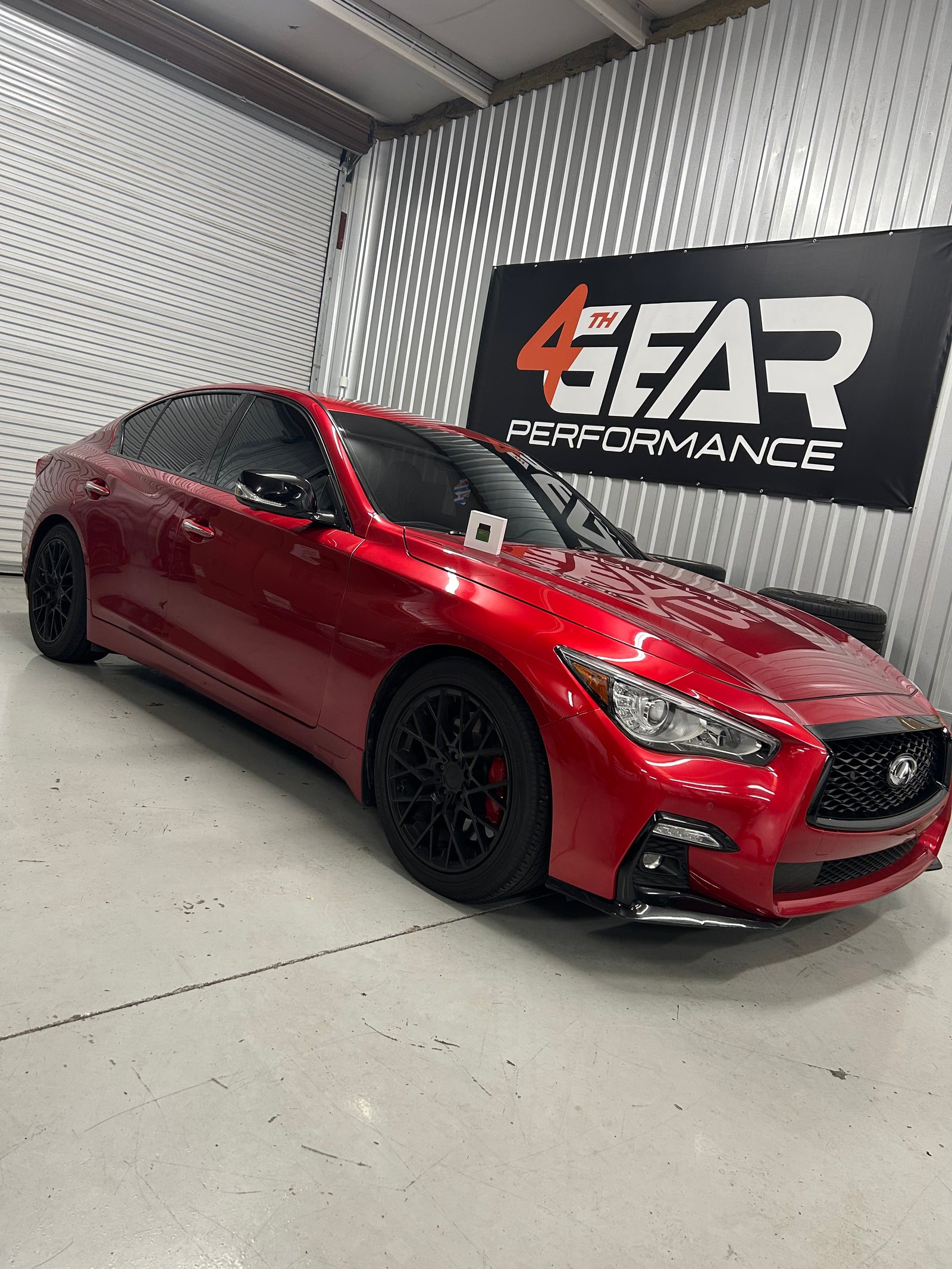 Red Infiniti Q50 sedan